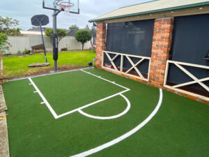 grass installation basketball court after