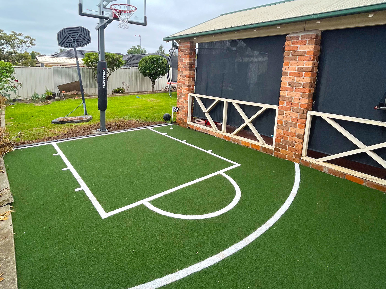 grass installation basketball court after