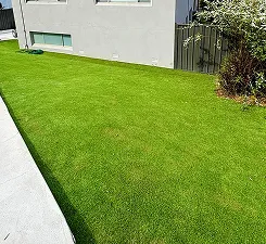 synthetic grass border installation finished