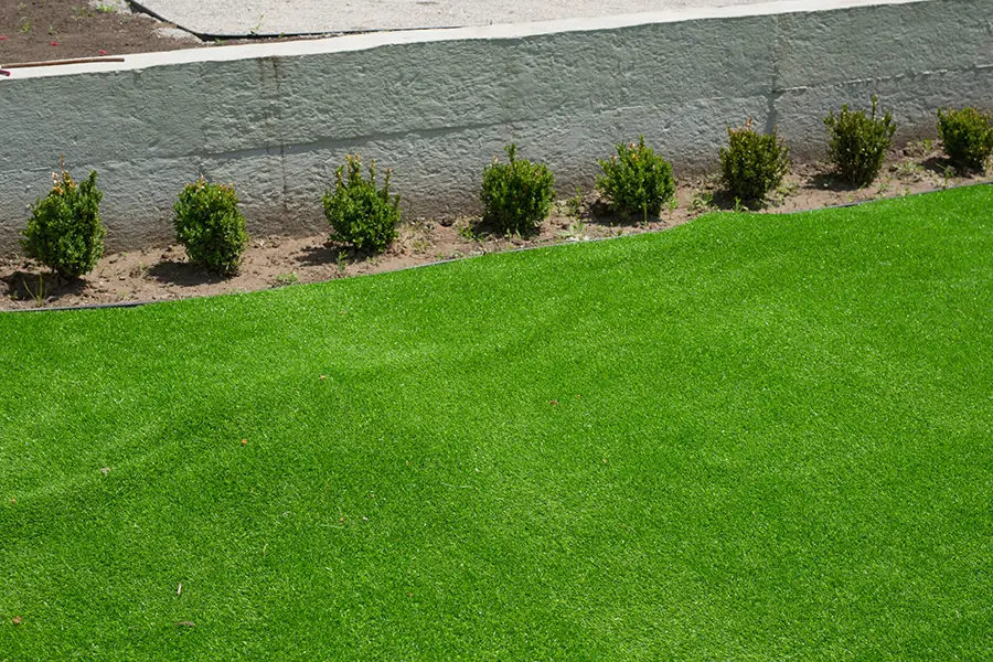artificial grass lifting near perimeter