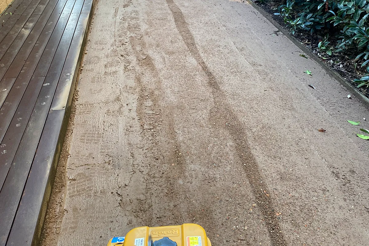 What Goes Under Artificial Grass Matters More Than the Grass Itself