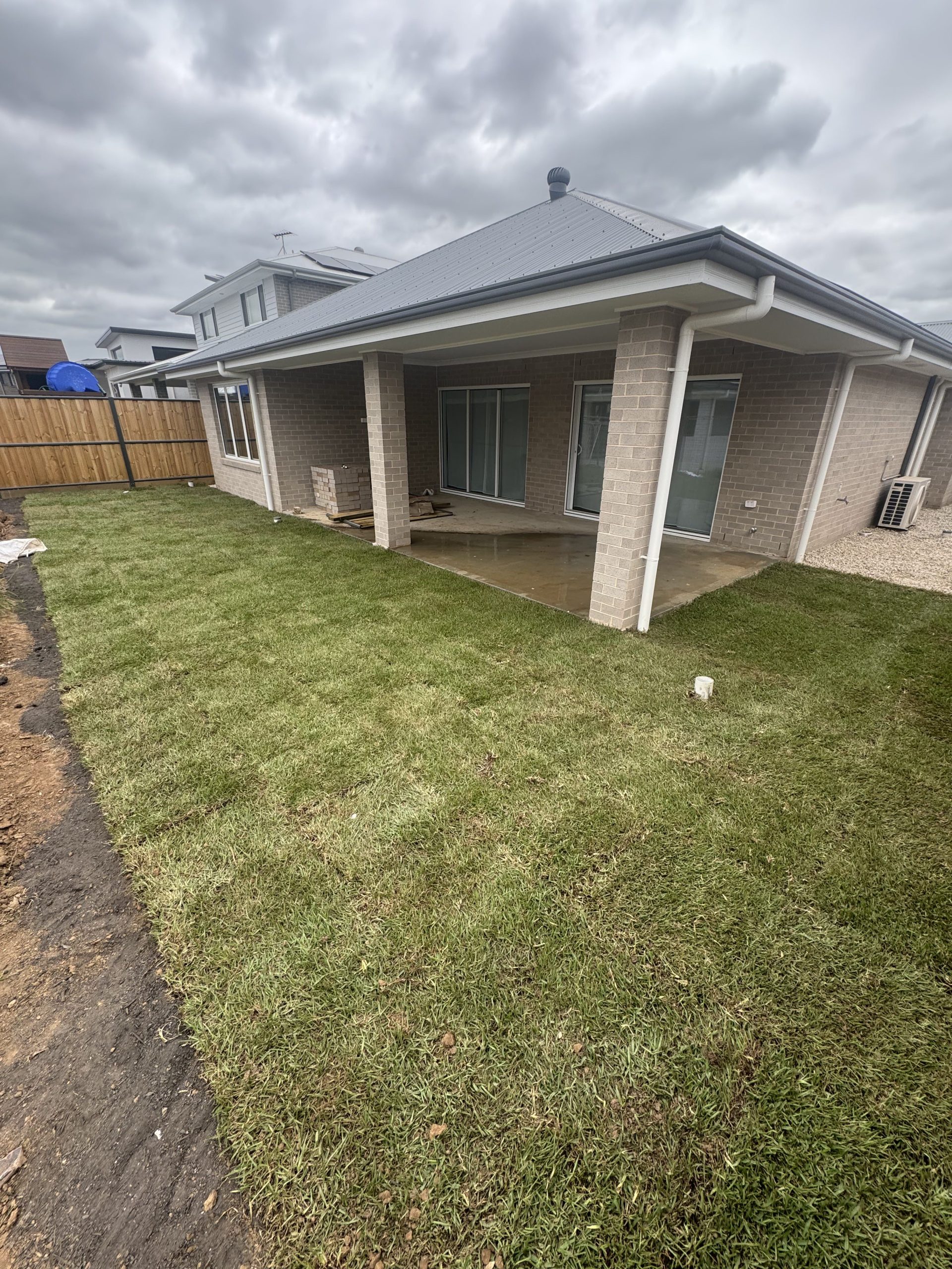 Natural turf installation in Sydney backyard - Pro Step Landscaping